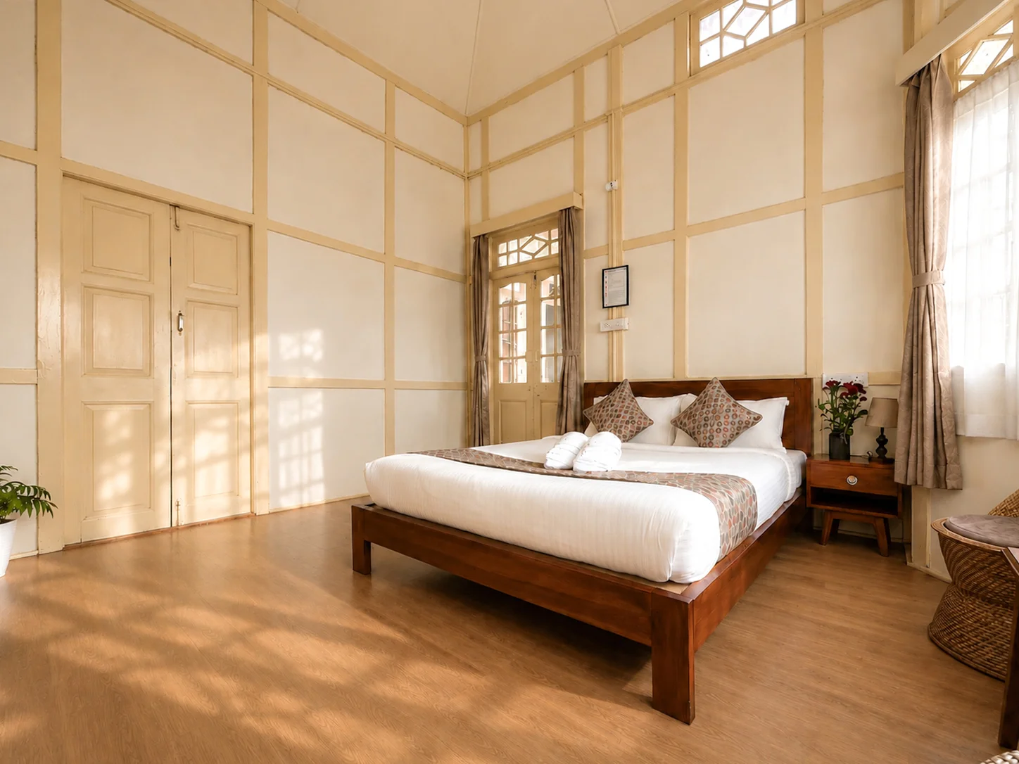 Vanilla Twilight’s timber bed beside the window.