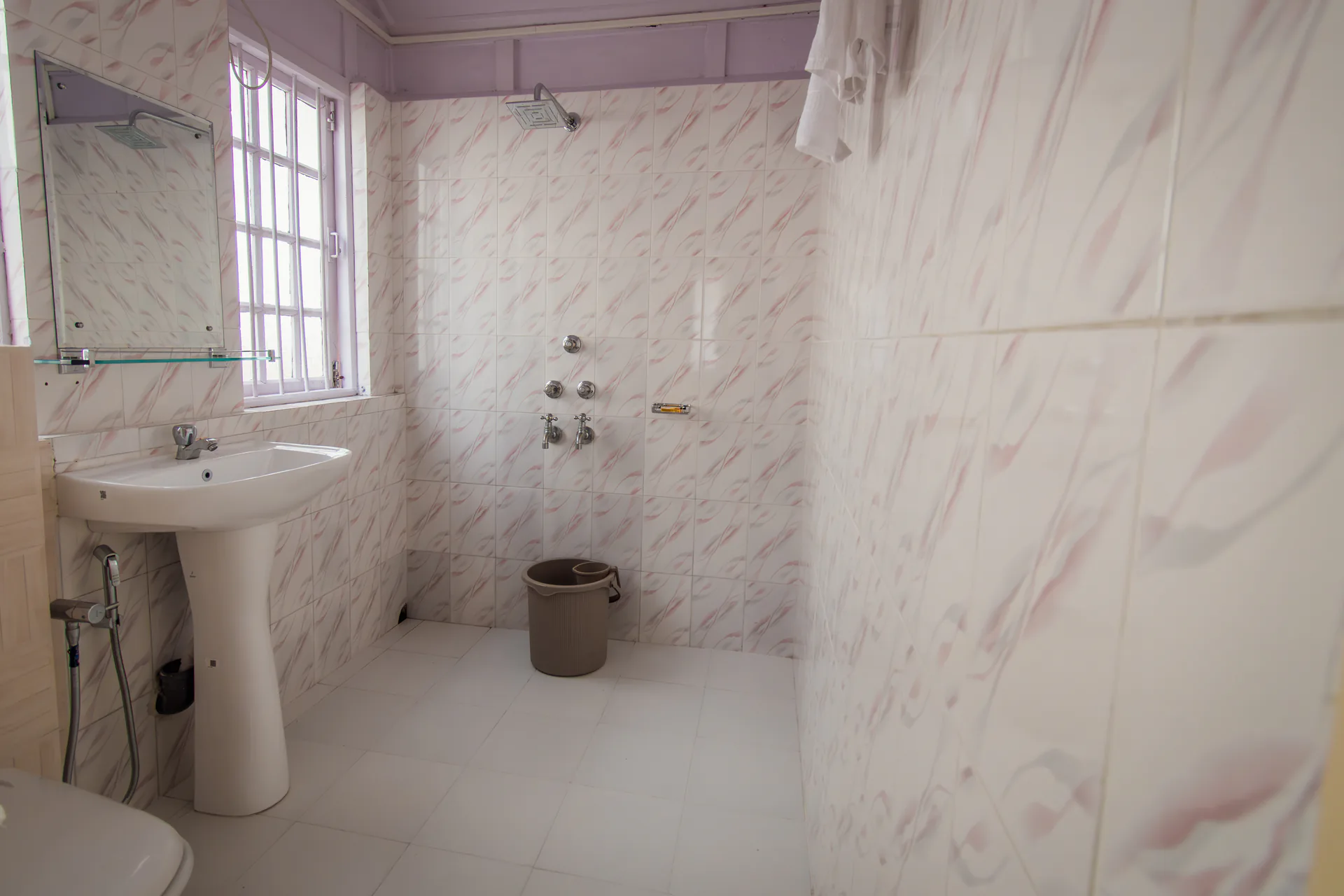 Vanilla Twilight’s private white-tiled bathroom.